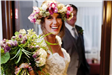 Bride and Groom Entering Hotel Room